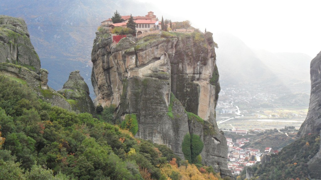 Meteora Monastery towering above village of Kastraki